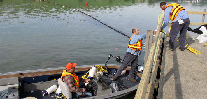 A sampling net being deployed. Photo courtesy of USCG.