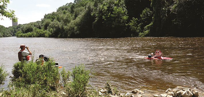 Collecting data on Milwaukee River. Photo by USGS.